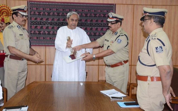 CM Naveen Patnaik presents Smart Policing Awards to Odisha DGP