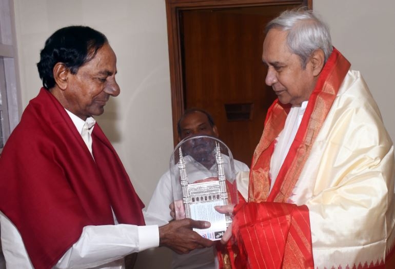 KCR called Naveen Patnaik a tall personality and  role model